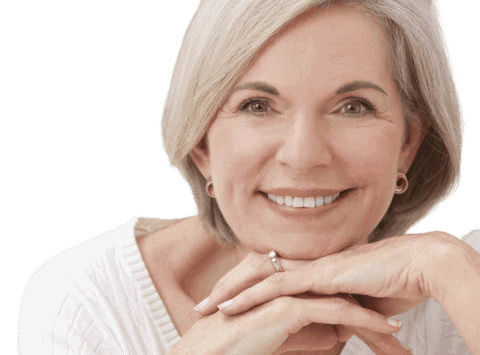 close up image of smiling mature woman with blond hair